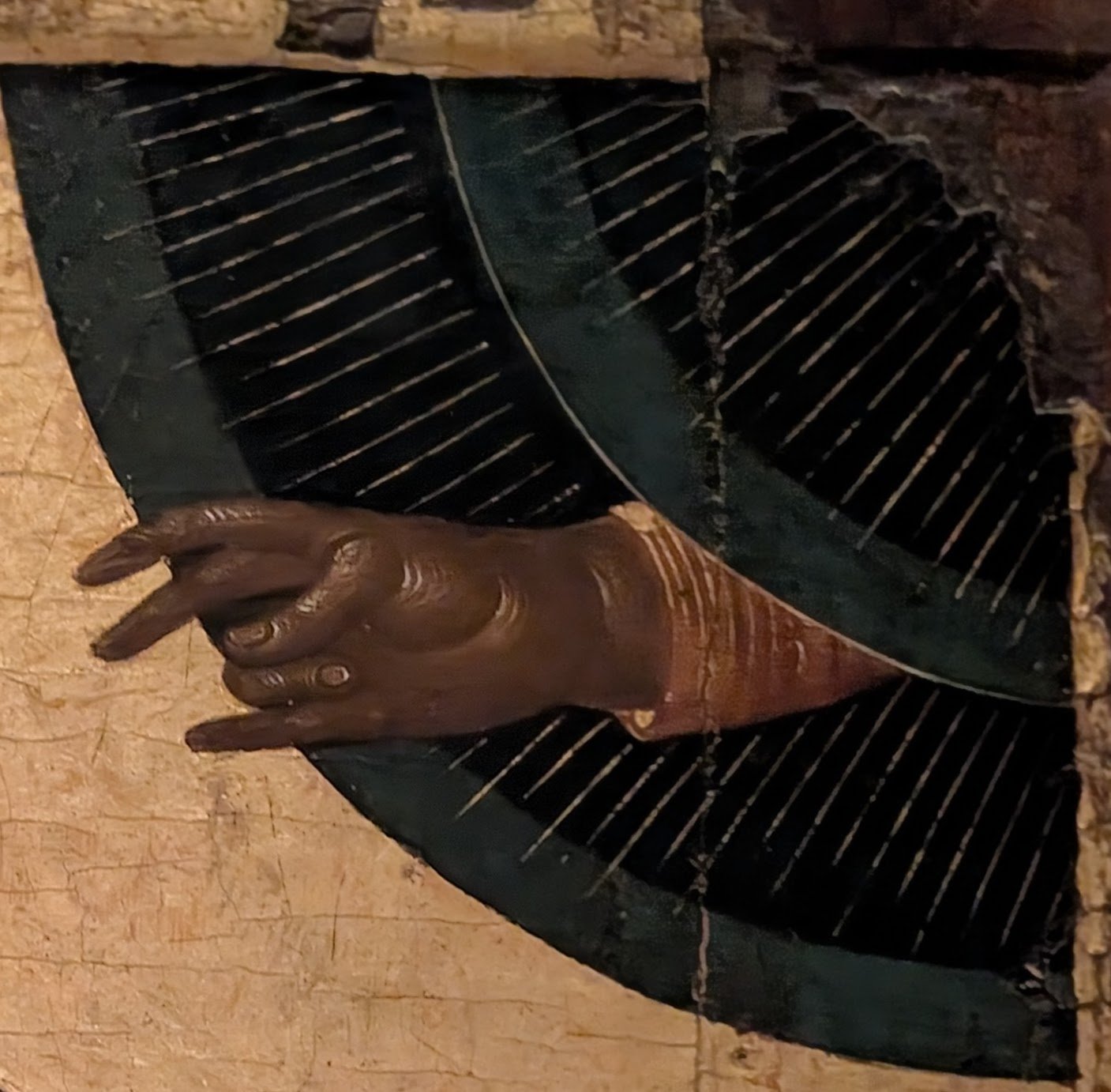 Thread and Threshold — detail of a hand from a devotional painting
